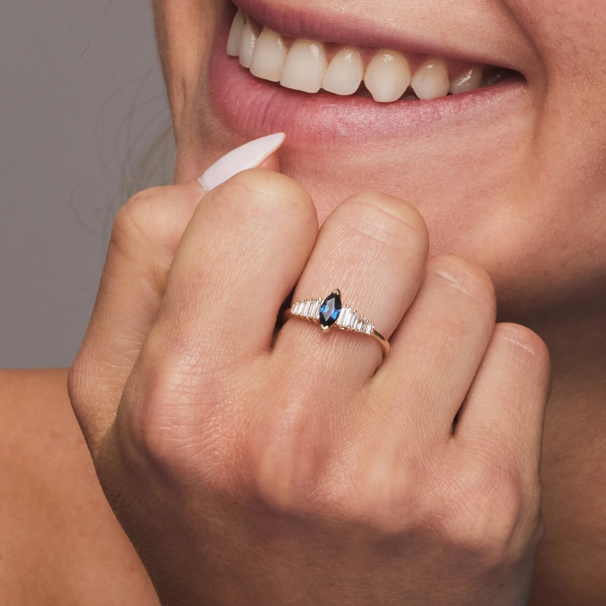 14k Gold Marquise Shape Sapphire  Ring with Baguette Accents