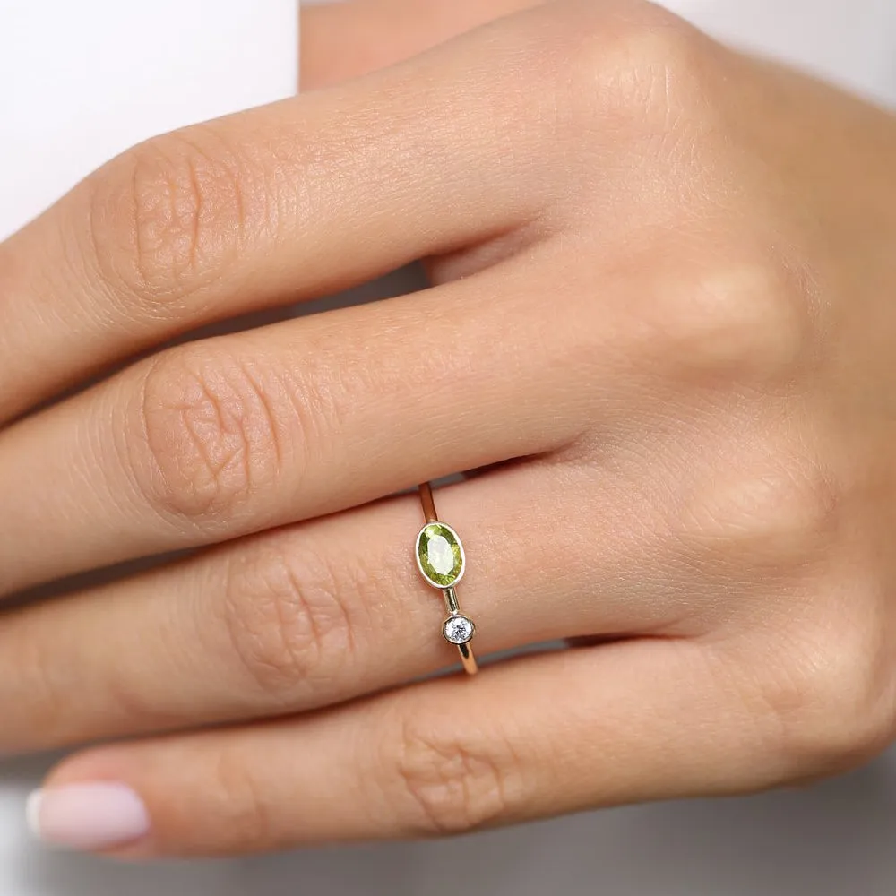 14k Gold Oval Peridot  and Diamond Ring