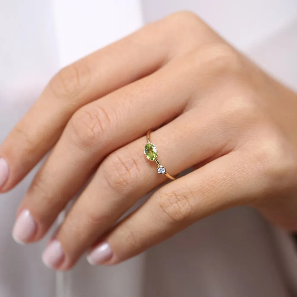 14k Gold Oval Peridot  and Diamond Ring
