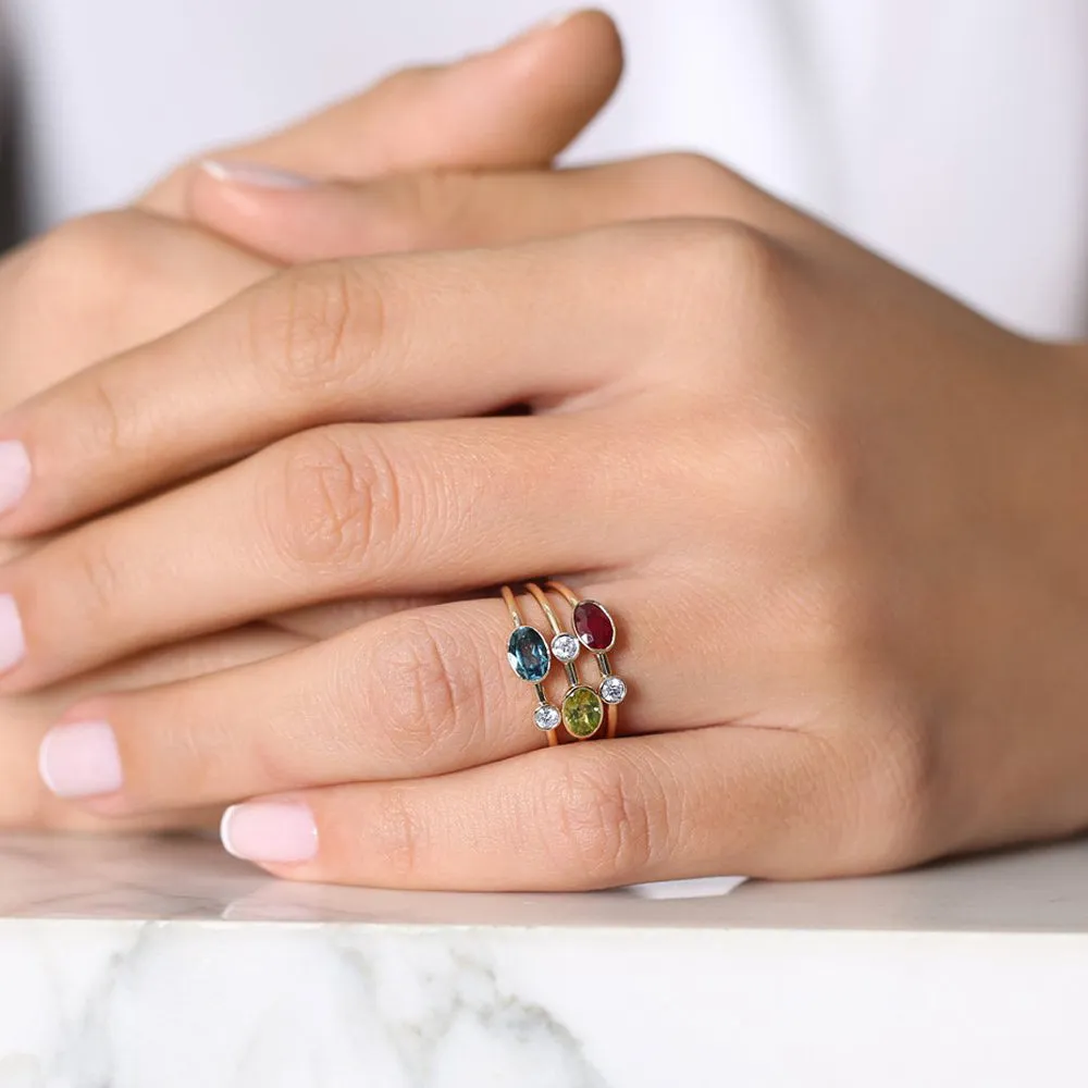14k Gold Oval Peridot  and Diamond Ring