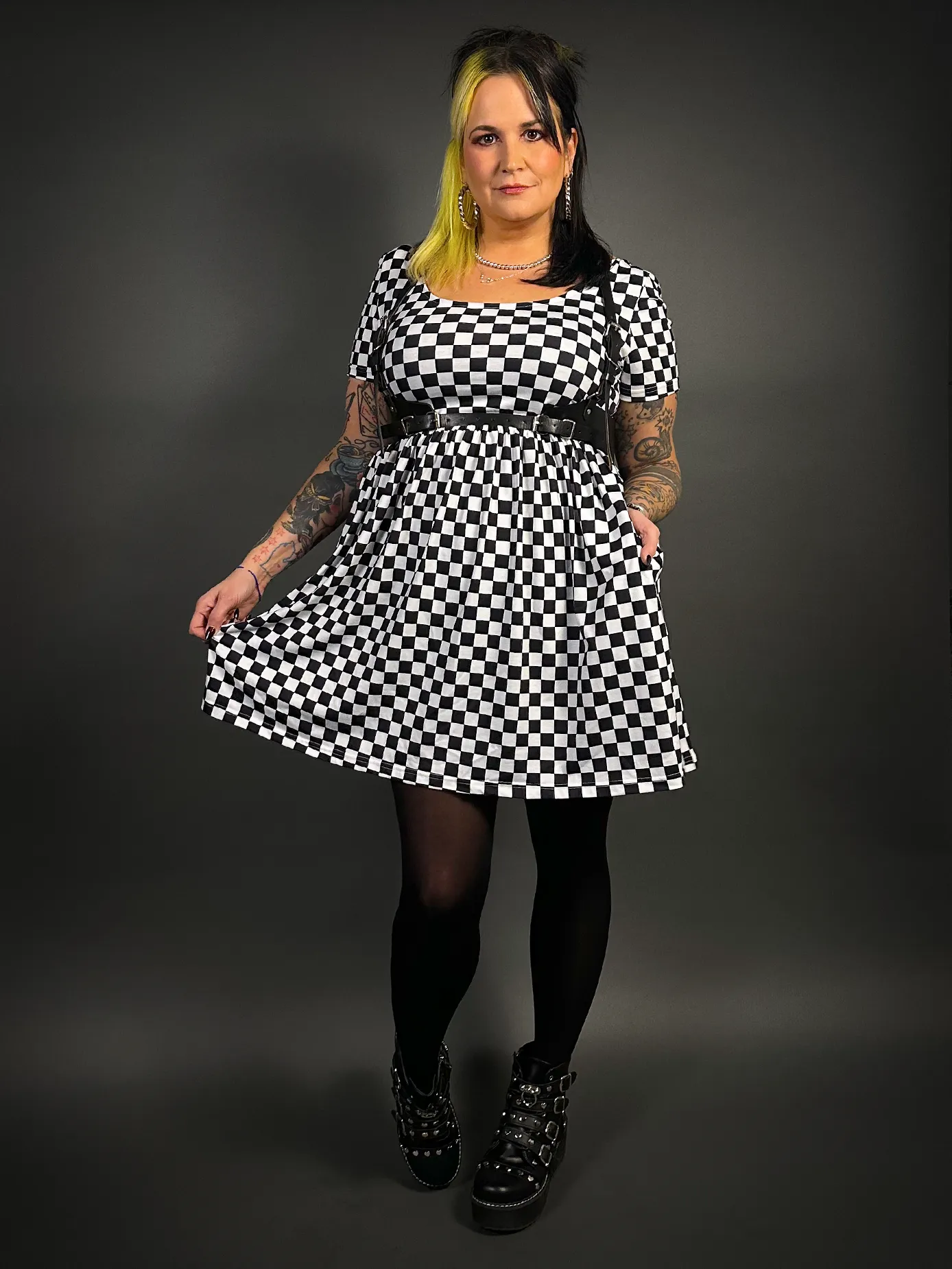 Stylish Checkered Skater Dress with Classic Black Shoulder Harness Belt