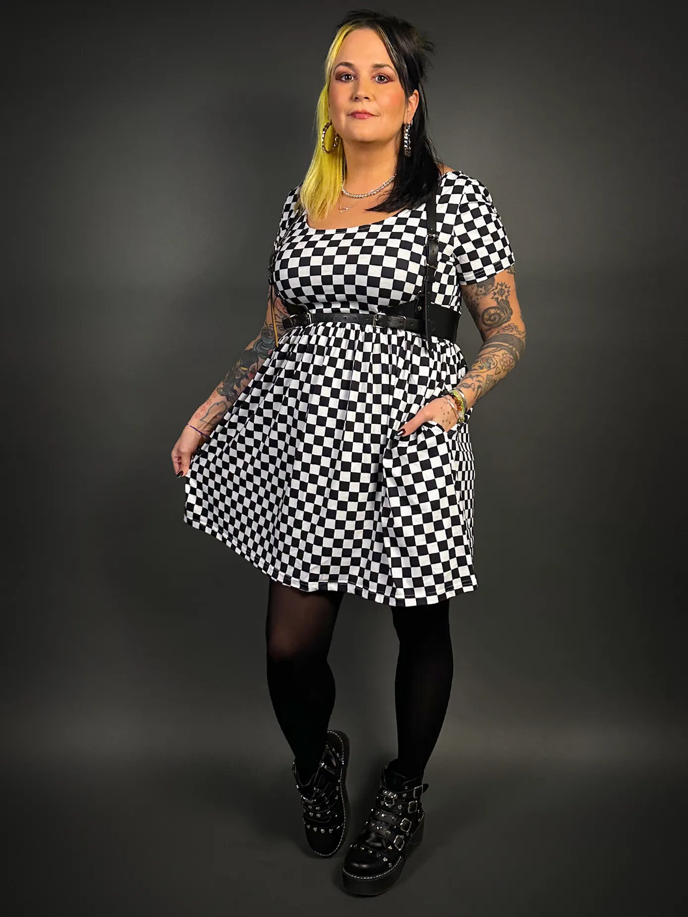 Stylish Checkered Skater Dress with Classic Black Shoulder Harness Belt