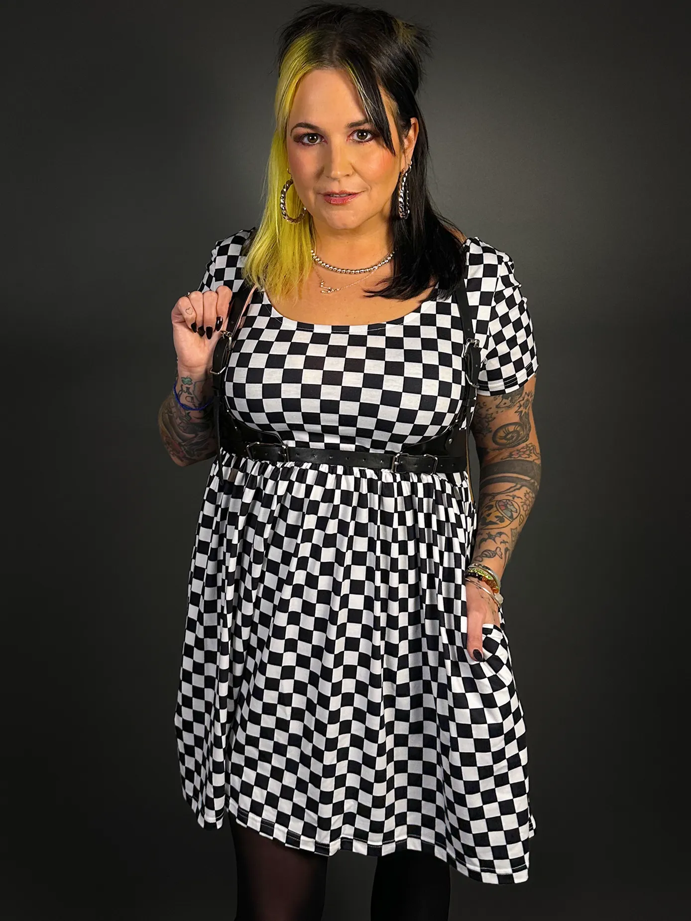 Stylish Checkered Skater Dress with Classic Black Shoulder Harness Belt