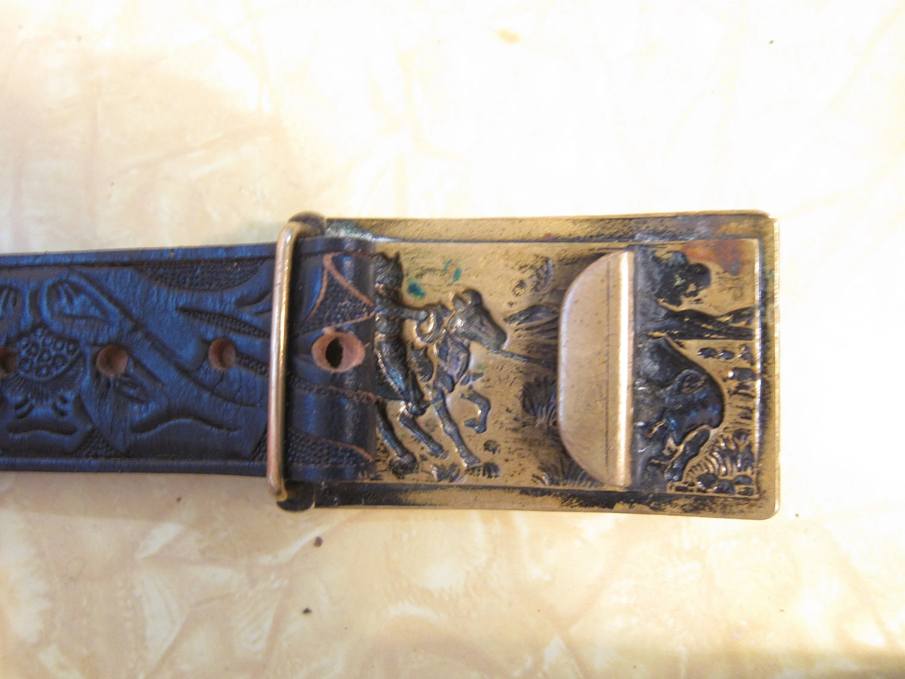 (up To 41.5") * Brass Buckle On Black Tooled Belt