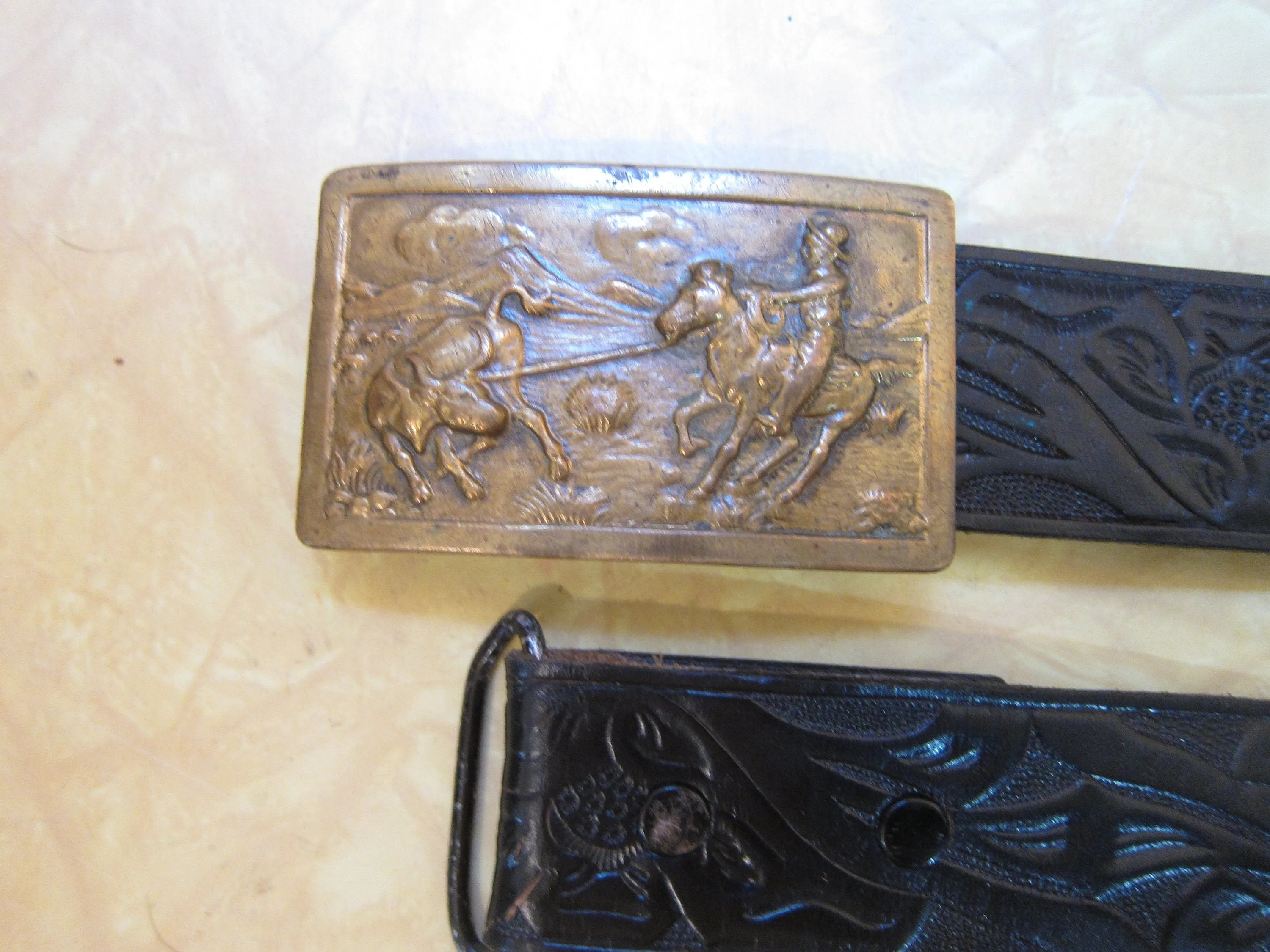 (up To 41.5") * Brass Buckle On Black Tooled Belt
