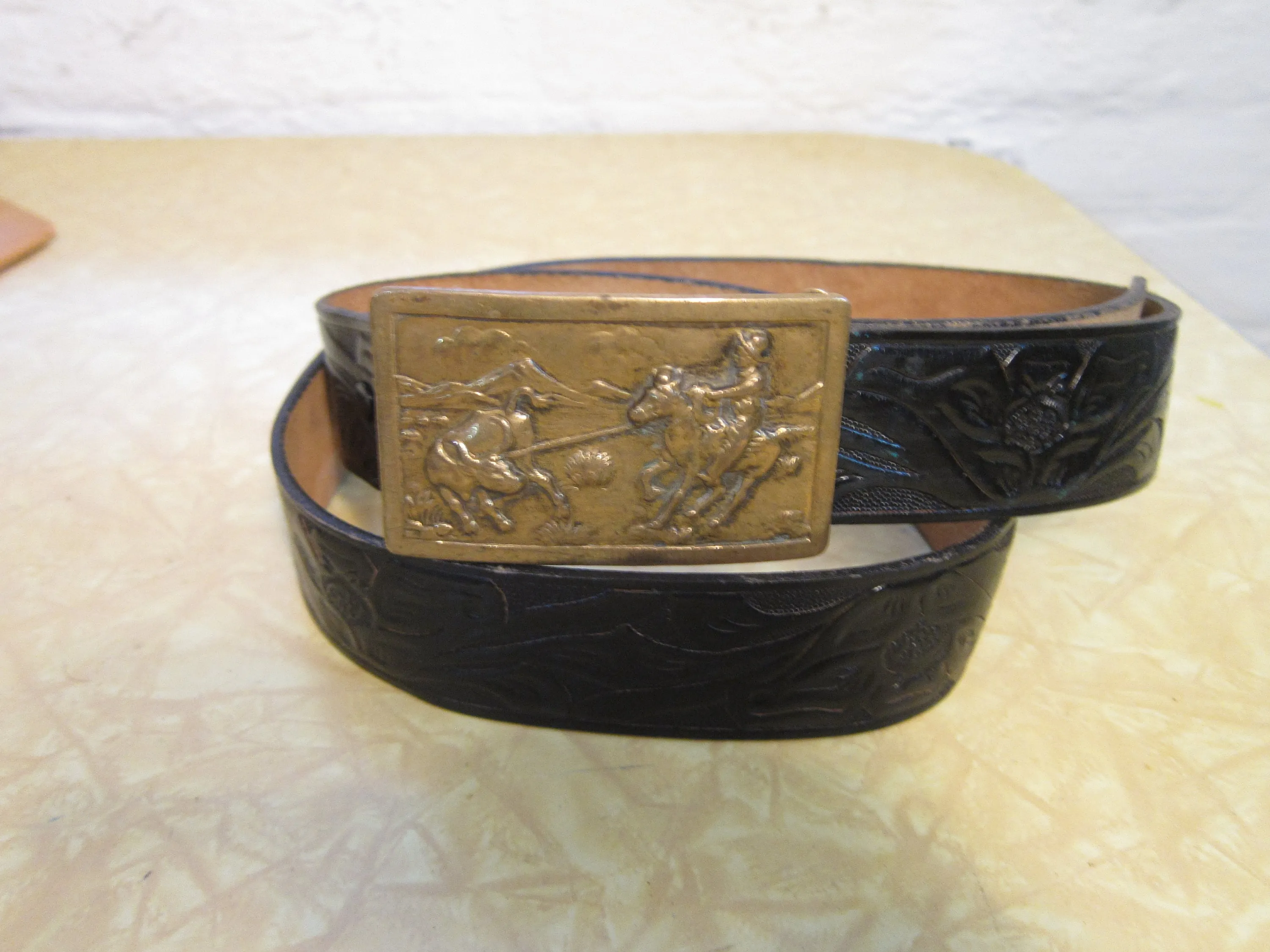 (up To 41.5") * Brass Buckle On Black Tooled Belt